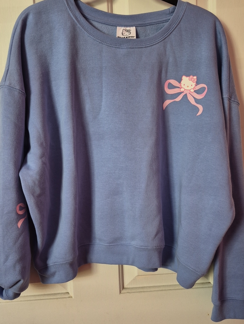 Hello Kitty Light Blue Sweatshirt with Pink Bow Accent